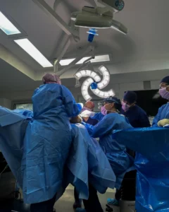 plastic surgeon operating on a patient