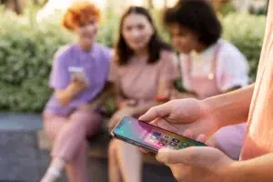 Close up hands holding smartphone